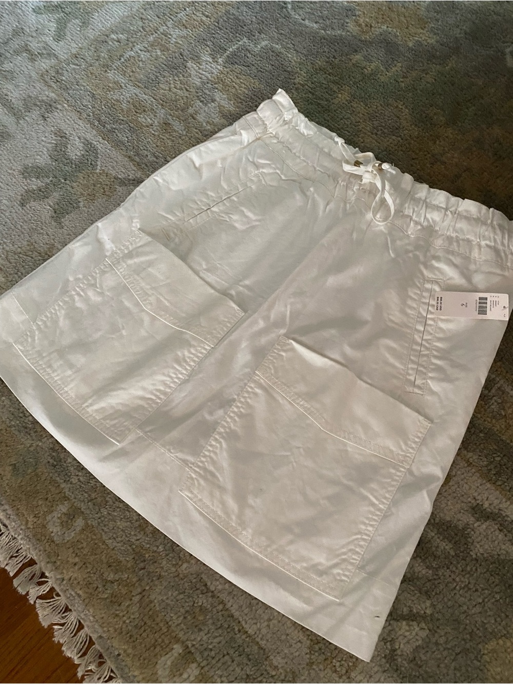 Adorable Anthropologie classic White smooth cotton skirt with adjustable waist.